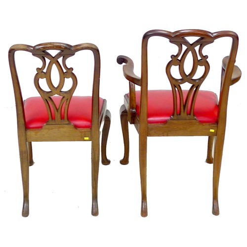 338 - A set of seven mahogany dining chairs, in the Georgian style, with red leather drop in seats, pierce... 