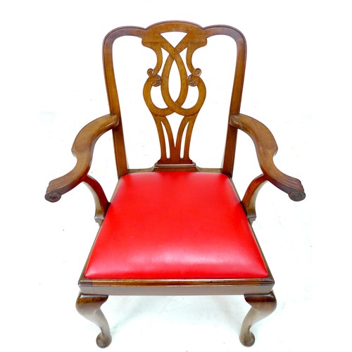 338 - A set of seven mahogany dining chairs, in the Georgian style, with red leather drop in seats, pierce... 