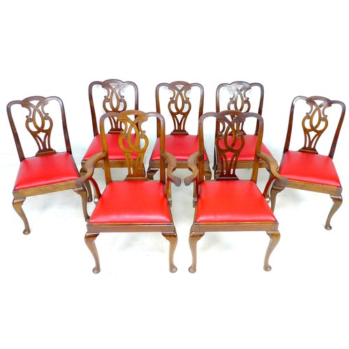 338 - A set of seven mahogany dining chairs, in the Georgian style, with red leather drop in seats, pierce... 