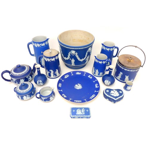 32 - A collection of Wedgwood blue jasperware, including tea service with teapot, milk jug and lidded suc... 
