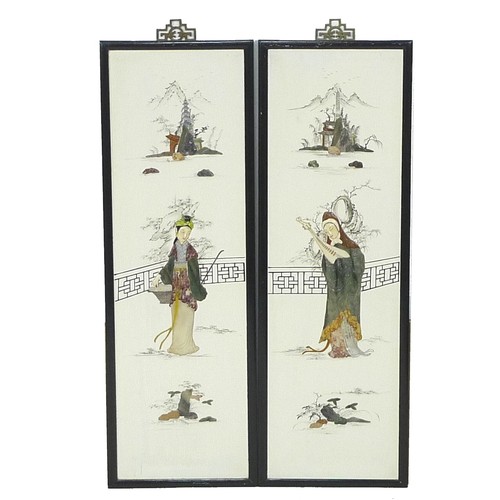 8 - A pair of Chinese hardstone inset pictures, each depicting a figure standing in a garden with fence ... 