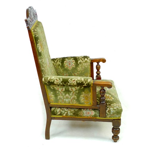 335 - A Victorian oak show frame armchair, with green upholstered back, armrests, and seat, 67 by 81 by 11... 