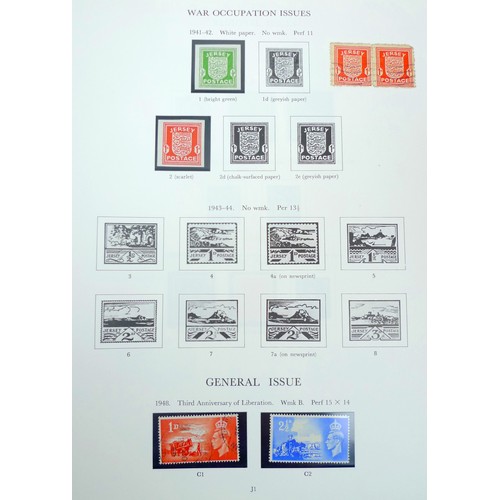 157 - Eight stamp albums containing stamps of the British Commonwealth, including Stanley Gibbons One Coun... 