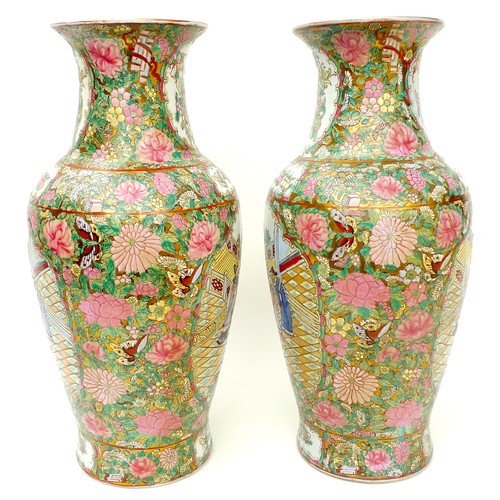 3 - A pair of 20th century Chinese Canton porcelain baluster vases, typically decorated with reserves of... 