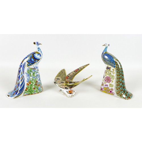44 - A group of three Royal Crown Derby paperweights, all modelled as birds, comprising 'Derby Peacock', ... 