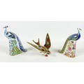 A group of three Royal Crown Derby paperweights, all modelled as birds, comprising 'Derby Peacock', ... 