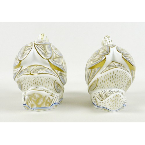 46 - A pair of Royal Crown Derby commemorative paperweights, modelled as 'The Royal Swans', 'William' and... 