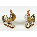 Two Royal Crown Derby paperweights, modelled as 'Imari Rooster', one of a pre-release edition of 150... 