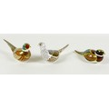 A group of three Royal Crown Derby paperweights, all modelled as birds, comprising a pair 'The Brace... 