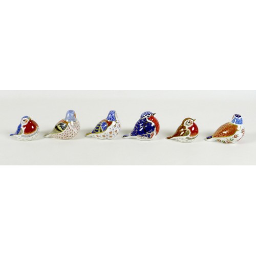 65 - A group of six Royal Crown Derby paperweights, all modelled as birds, comprising 'Anniversary Robin'... 