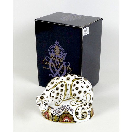 73 - A Royal Crown Derby paperweight, modelled as 'Snow Leopard', MMXII, gold stopper, 12.5cm high, boxed... 