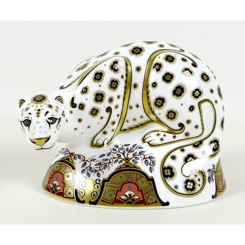 73 - A Royal Crown Derby paperweight, modelled as 'Snow Leopard', MMXII, gold stopper, 12.5cm high, boxed... 