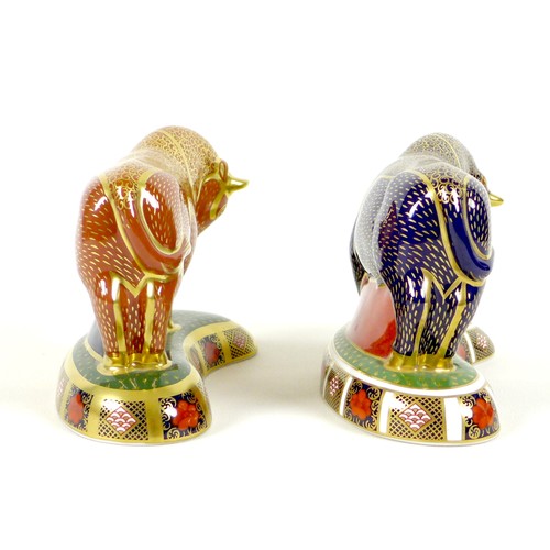 75 - Two Royal Crown Derby paperweights, modelled as 'Harrods Bull', one of a limited edition of 400 Spec... 