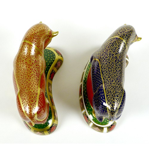 75 - Two Royal Crown Derby paperweights, modelled as 'Harrods Bull', one of a limited edition of 400 Spec... 