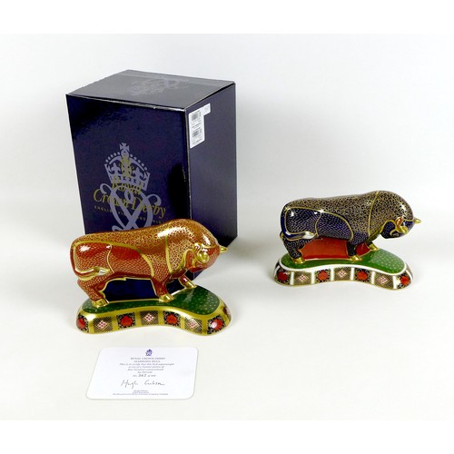 75 - Two Royal Crown Derby paperweights, modelled as 'Harrods Bull', one of a limited edition of 400 Spec... 