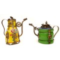 Two early 20th century Chinese wine pots, both with white metal mounts and dragon form spouts, circu... 