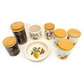 A group of vintage storage pots with wooden lids, comprising two Portmeirion 'Magic City' pattern (l... 