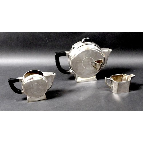 2 - An Art Deco silver plated two piece tea set, comprising teapot, 16.5cm high, and milk jug, 10cm high... 