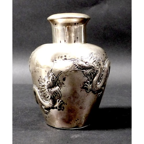 24 - A Chinese silver tea caddy, by Luen Wo, Shanghai, circa 1880, of ovoid form repousse decorated with ... 