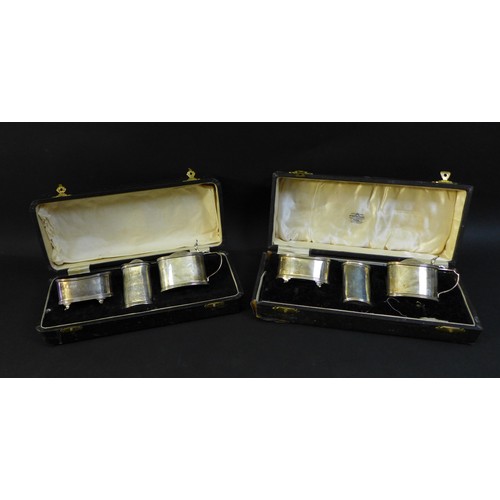 69 - A pair of matching George VI silver cruet sets, each comprising oval salt cellar with reeded rim, ov... 