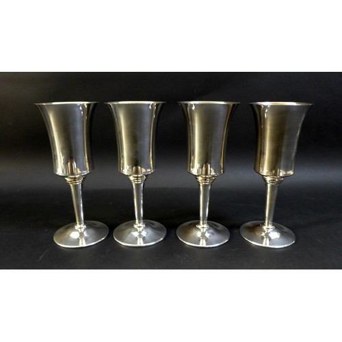 88 - Four ERII  Silver goblets, with flared rims, gilt interiors, raised upon a circular foot,  three hal... 