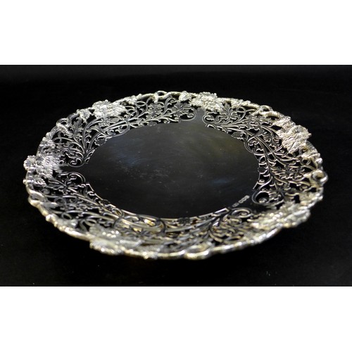 81 - A George VI silver pedestal dish, with piereced floral decoration to its rim, and stepped pedestal b... 