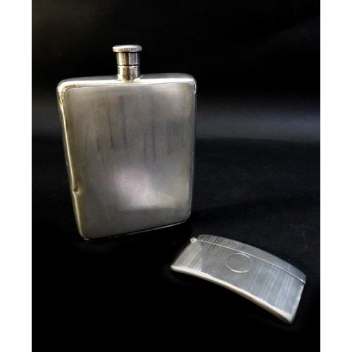 49 - Two pieces of George VI and late silver, comprising an ERII silver hip flask, with engine turned dec... 