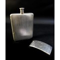 Two pieces of George VI and late silver, comprising an ERII silver hip flask, with engine turned dec... 