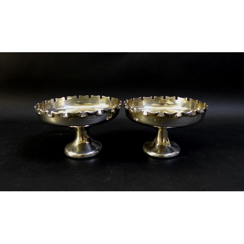 67 - A group of Edwardian and later silver, including a pair of bon bon dishes of circular form with weig... 