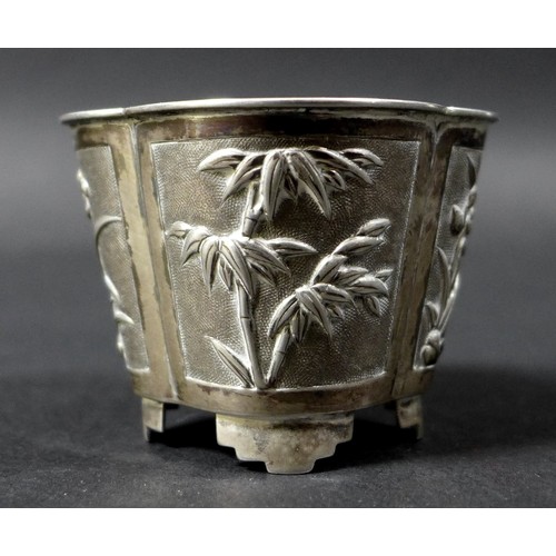 12 - A late 19th century Chinese silver pot, the tapering quatrefoil body chased and embossed with foliat... 