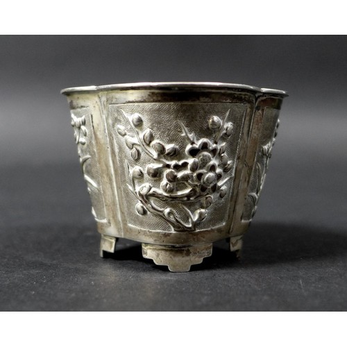 12 - A late 19th century Chinese silver pot, the tapering quatrefoil body chased and embossed with foliat... 