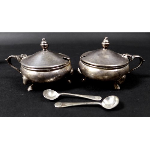 72 - Two matching Elizabeth II silver cruet sets, one set by Mappin and Webb, the other Roberts and Belk ... 