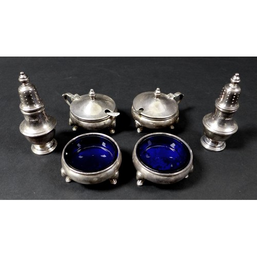 72 - Two matching Elizabeth II silver cruet sets, one set by Mappin and Webb, the other Roberts and Belk ... 