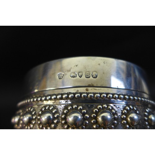 63 - A Victorian silver goblet, ornately decorated with a blank cartouche and profuse beaded decoration, ... 