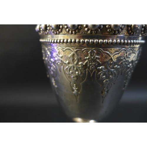 63 - A Victorian silver goblet, ornately decorated with a blank cartouche and profuse beaded decoration, ... 