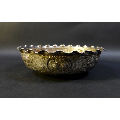 66 - A 19th century continental white metal bowl, with repousse floral decoration throughout, 14.4toz, 22... 