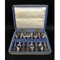 A cased set of eight possibly American silver teaspoons,  with shell mounts, and engraved with 'CPR'... 