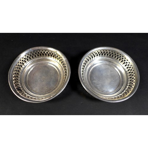 56 - A collection of Edwardian and later silver, comprising a pair of George V bon bon dishes with pierce... 