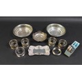 A collection of Edwardian and later silver, comprising a pair of George V bon bon dishes with pierce... 