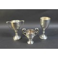 Three silver cups, comprising a George V Christening goblet, inscribed 'J.H.W. 24 Jan 1929', William... 