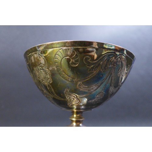 83 - An Edwardian silver chalice, decorated with floral sprays and Tudor roses, R H Halford & Sons, Londo... 