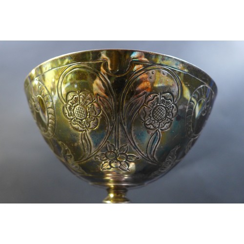 83 - An Edwardian silver chalice, decorated with floral sprays and Tudor roses, R H Halford & Sons, Londo... 