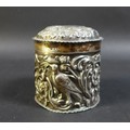 A Victorian silver lidded pot, of cylindrical form, with a engraved monogram 'H E' to its cartouche ... 