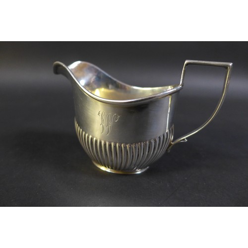 61 - A collection of Victorian and later silver, comprising a two Edwardian tea wares, both with engraved... 