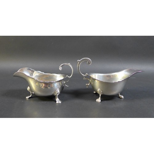 61 - A collection of Victorian and later silver, comprising a two Edwardian tea wares, both with engraved... 