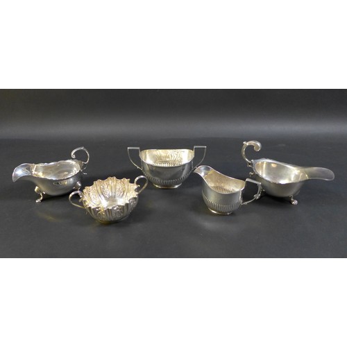 61 - A collection of Victorian and later silver, comprising a two Edwardian tea wares, both with engraved... 