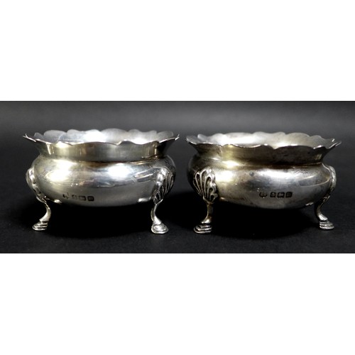 84 - Thirteen Victorian and later silver salts and mustard pots, including a six cauldron style salts, th... 