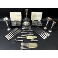 A collection of Edwardian and later silver, including two George VI cased sets of six silver handled... 