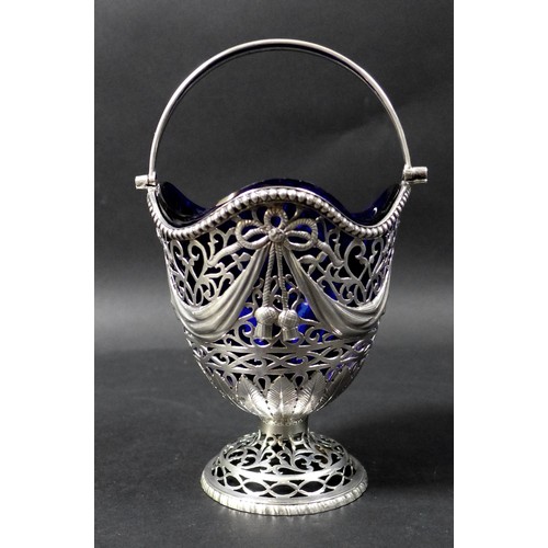 42 - A George V Irish silver pedestal basket dish, with undulating rim and bead border, plain hinged hand... 