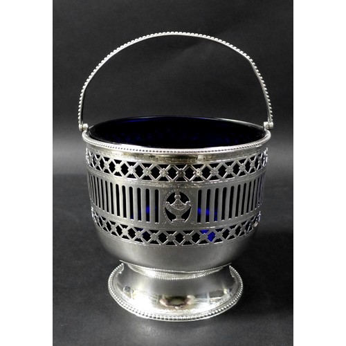 73 - A George III silver pedestal basket, or ice pail, the beaded upper rim above a pierced and chased bo... 